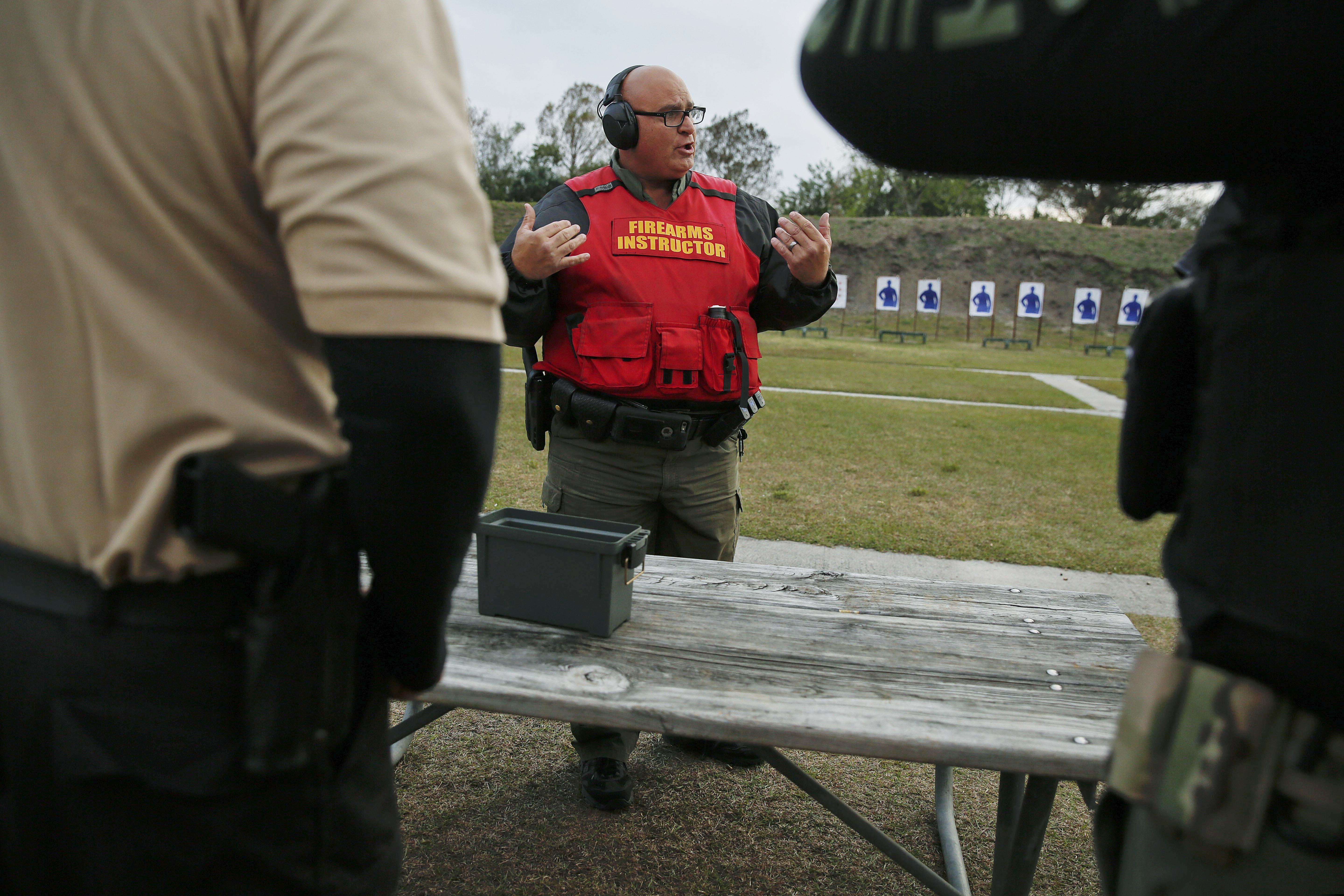 (Brynn Anderson | AP) Sgt. Michael Hazellief talks to school "guardians" during a training session in Okeechobee, Fla, on Jan. 30, 2019. Florida’s Guardian Program was established in 2018, following the Marjory Stoneman Douglas High School shooting. Utah lawmakers are considering a similar program, according to recently floated draft legislation.