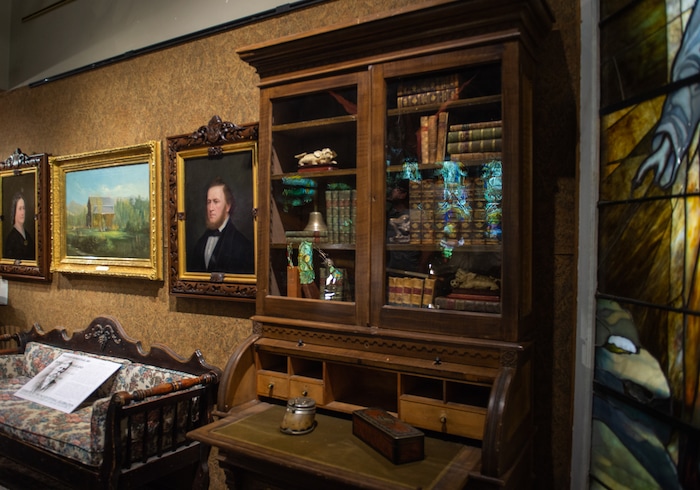 (Rachel Molenda  |  The Salt Lake Tribune)  A pine desk passed down by the family of Brigham Young at Anthony's Fine Art in Salt Lake City, on Thursday, July 19, 2018. The shop has a collection of early pioneer art and furniture on display.