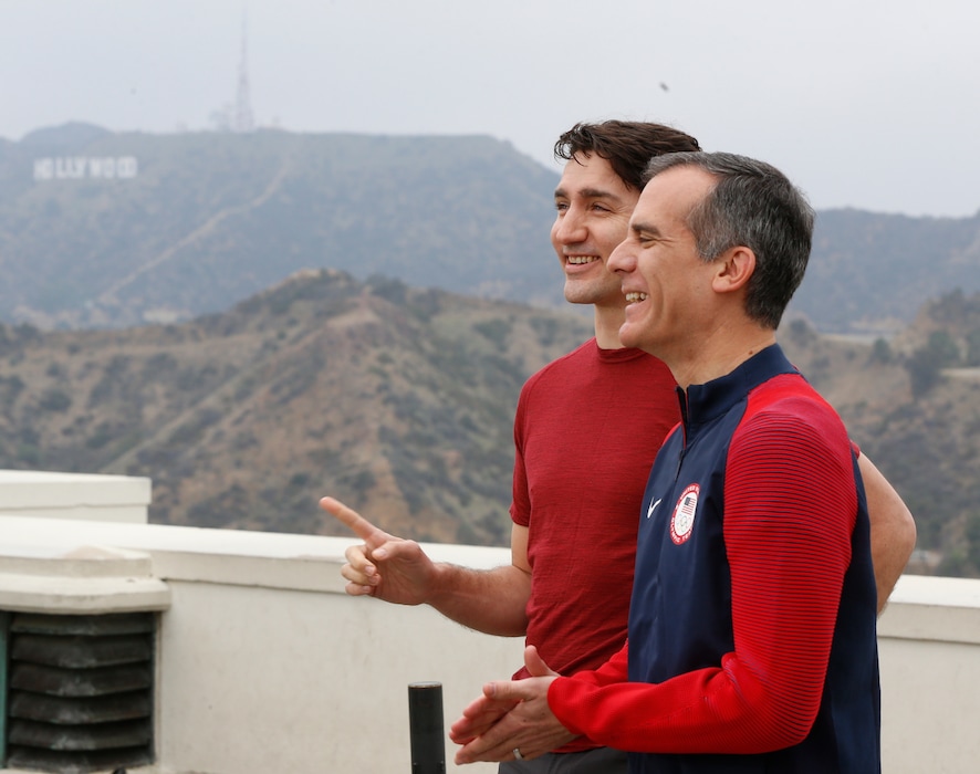 Canadian Prime Minister Justin Trudeau, left, and Los Angeles Mayor Eric Garcetti hold a joint news conference at the Griffith Observatory Saturday, Feb. 10, 2018. (AP Photo/Damian Dovarganes)