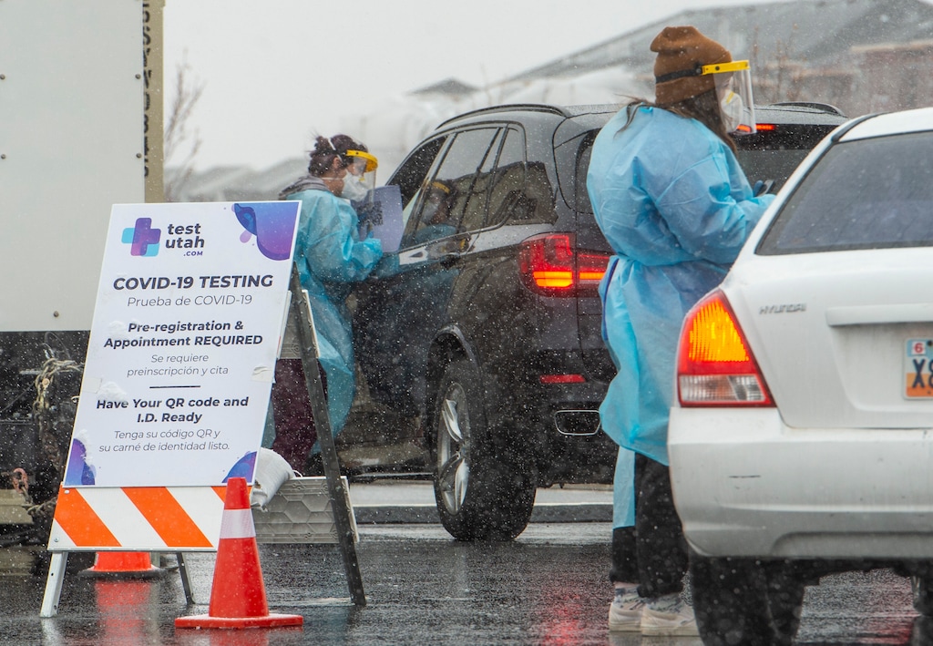 (Rick Egan | Salt Lake Tribune file photo) Nurses test for COVID-19 at the TestUtah site in Herriman on Friday, Feb. 5, 2021.