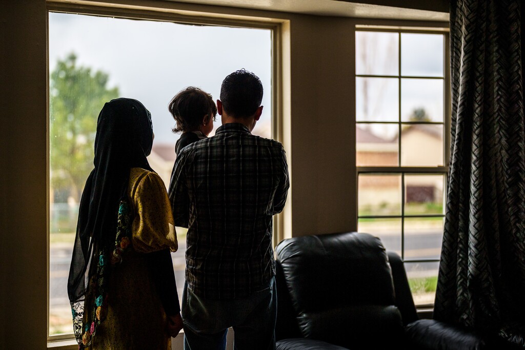 (Trent Nelson | The Salt Lake Tribune) Ahmad, an Afghan native who worked as an interpreter for the U.S. Army, with his wife, Hosna, and their son, Osman, in their West Valley City home on Tuesday, April 12, 2022.