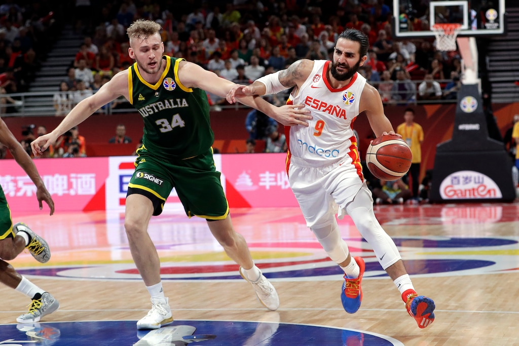 (Mark Schiefelbein | AP Photo) Ricky Rubio of Spain, right, drives past Jock Landale of Australia during their semifinal match in the FIBA Basketball World Cup at the Cadillac Arena in Beijing, Friday, Sept. 13, 2019.