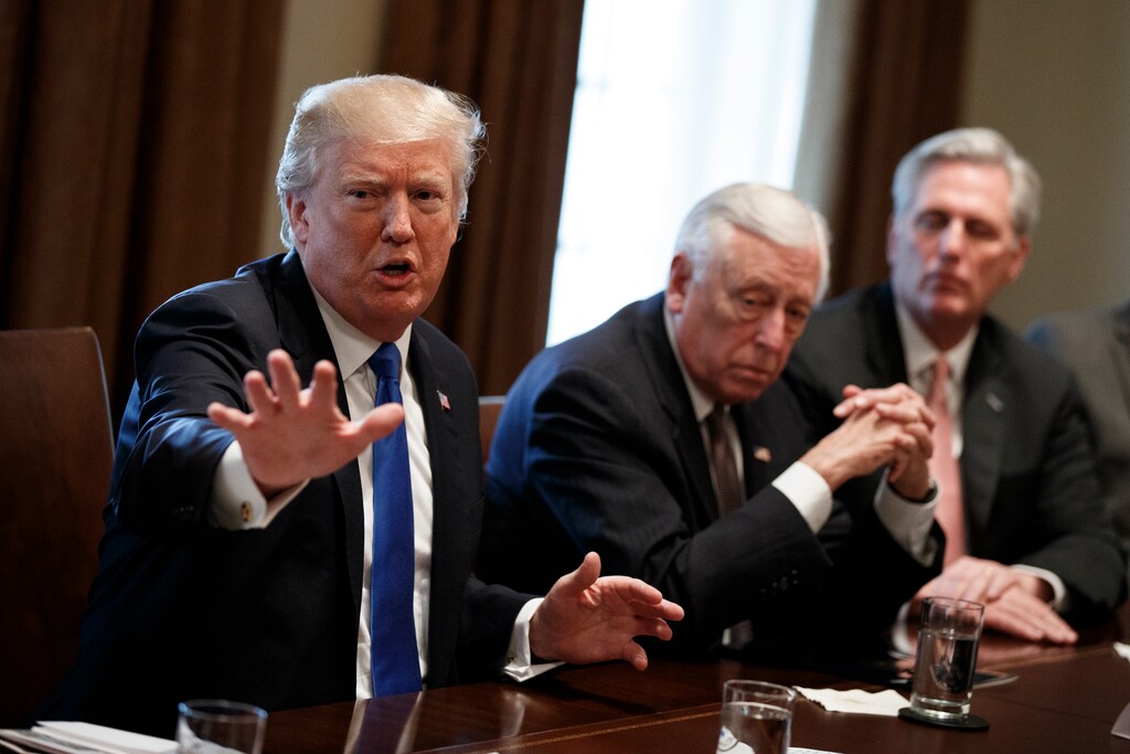 President Donald Trump speaks during a meeting with lawmakers on immigration policy in the Cabinet Room of the White House, Tuesday, Jan. 9, 2018, in Washington. From left, Trump, Rep. Steny Hoyer, D-Md., and Rep. Kevin McCarthy, R-Calif. (AP Photo/Evan Vucci)