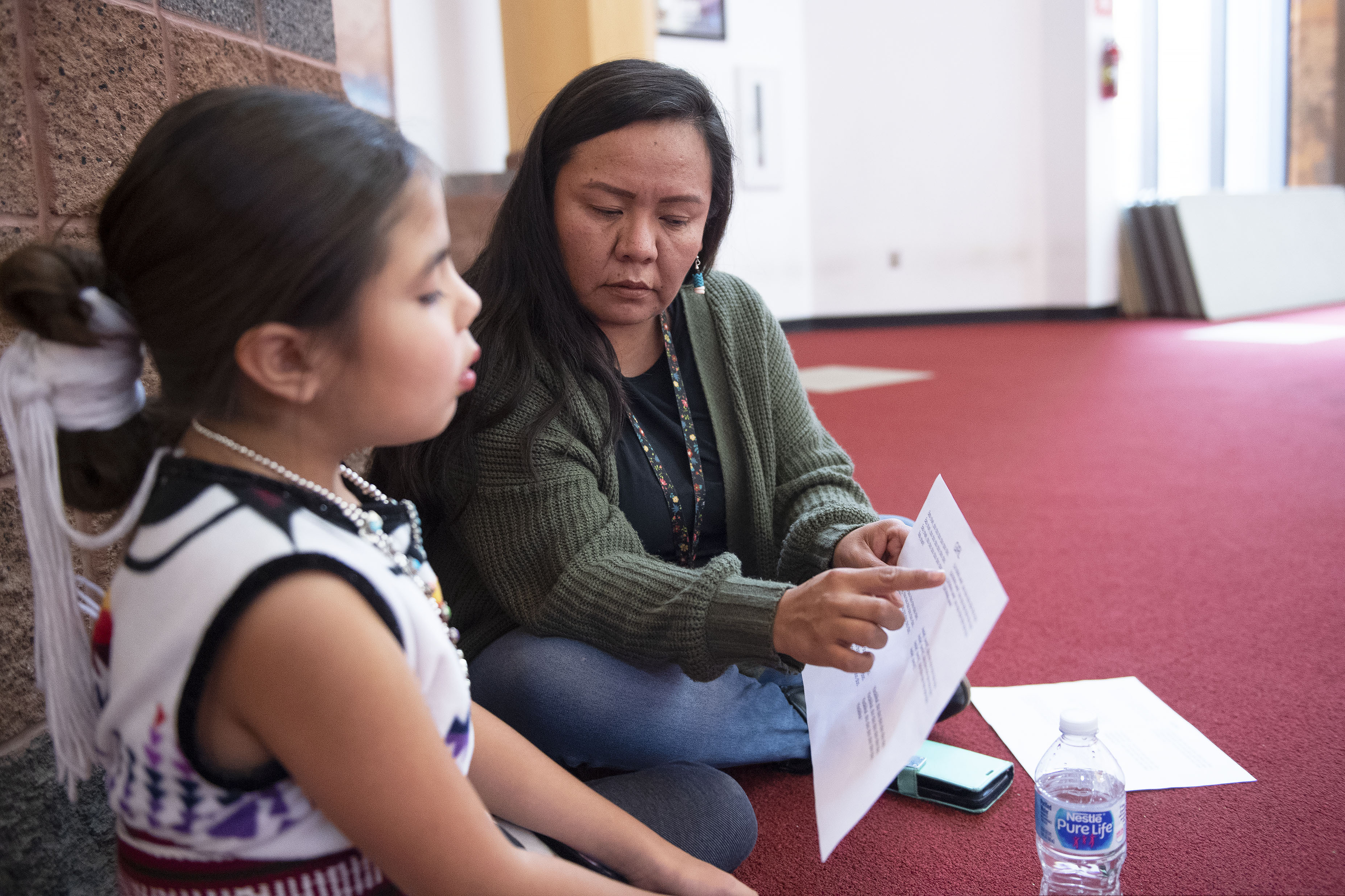 (Alma E. Hernandez | Gallup Independent via AP) In this Dec. 8, 2019 photo, Katrina Begay practicing lines with her daughter Drew Wilson at "Baby Shark" auditions at the Navajo Nation Museum in Window Rock, Ariz. Begay and her daughter traveled from Rock Point, Ariz., to audition for the roles of Mama Shark and Baby Shark.