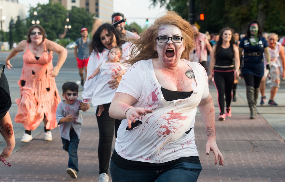    (Rick Egan  |  The Salt Lake Tribune)       Zombies run down 300 East in Salt Lake,  during the 11th annual Salt Lake Zombie Walk, Sunday, Aug. 26, 2018.