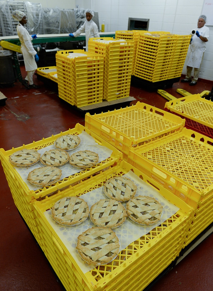 Francisco Kjolseth | The Salt Lake TribunePineapple pies are pulled from the oven and readied for transport at Rocky Mountain Pie factory in Salt Lake City recently. 