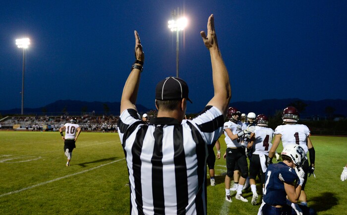 (Francisco Kjolseth  |  The Salt Lake Tribune)  Jordan quarterback Crew Wakley runs the ball into the end zone for a touchdown in the third quarter against Syracuse in game action at Syracuse on Thursday, Aug. 24, 2017.