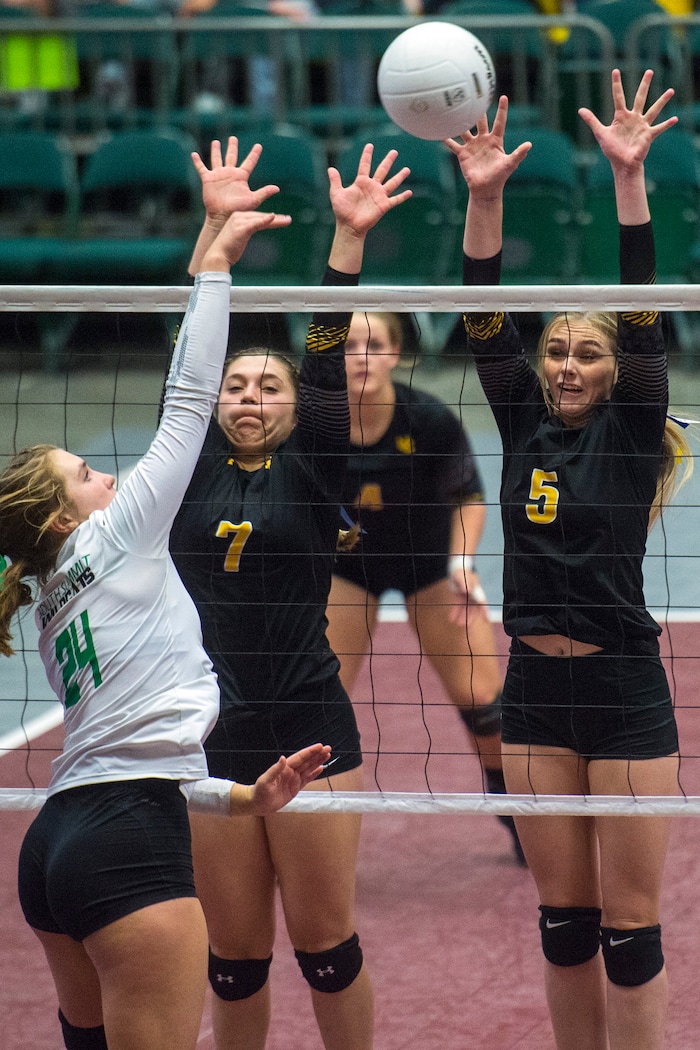 (Chris Detrick  |  The Salt Lake Tribune)  Union's Taylor Rundell (5) and Union's Marleigh Harrocks (7) block South Summit's Kinley Gines (24) during the 3A volleyball state quarterfinals at the UCCU Center at Utah Valley University Wednesday, October 25, 2017.  