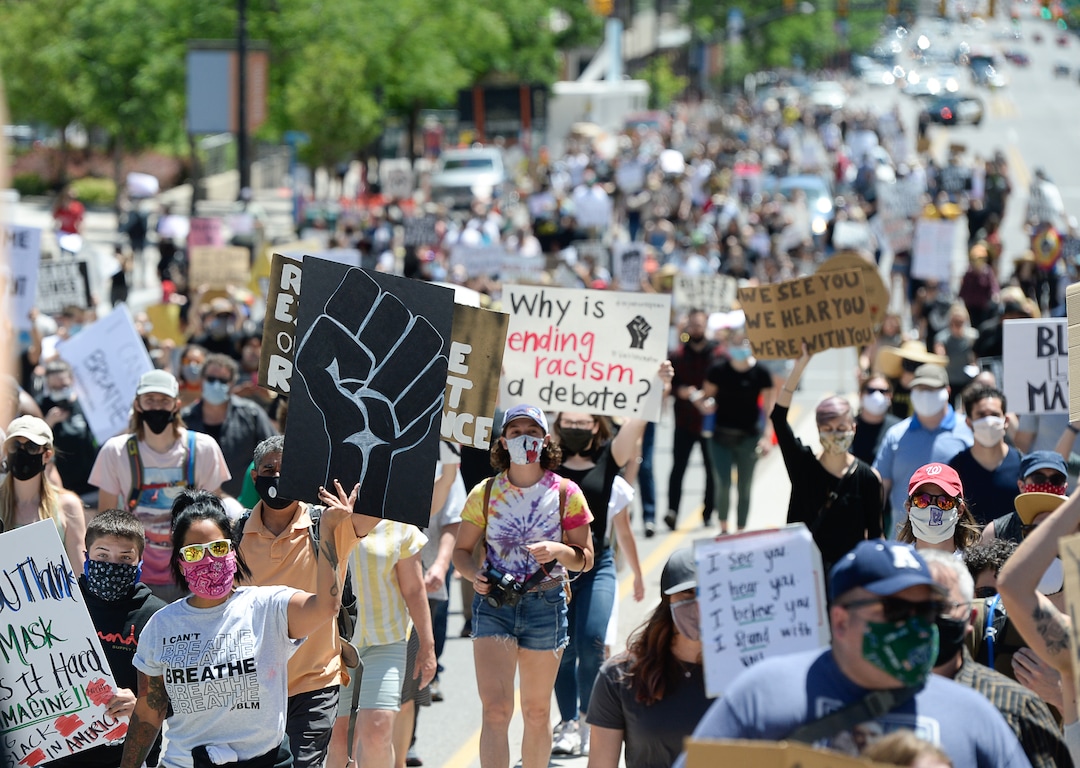 (Francisco Kjolseth  |  The Salt Lake Tribune) Demonstrators march the streets of downtown Salt Lake City for a rally as part of a series of Juneteenth celebrations on Friday, June 19, 2020.