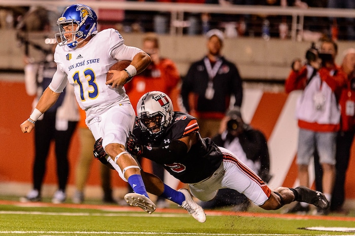 (Trent Nelson | The Salt Lake Tribune) Utah Utes linebacker Kavika Luafatasaga (5) sacks San Jose State Spartans quarterback Sam Allen (13) as the Utah Utes host the San Jose State Spartans, NCAA football at Rice-Eccles Stadium in Salt Lake City, Saturday September 16, 2017.