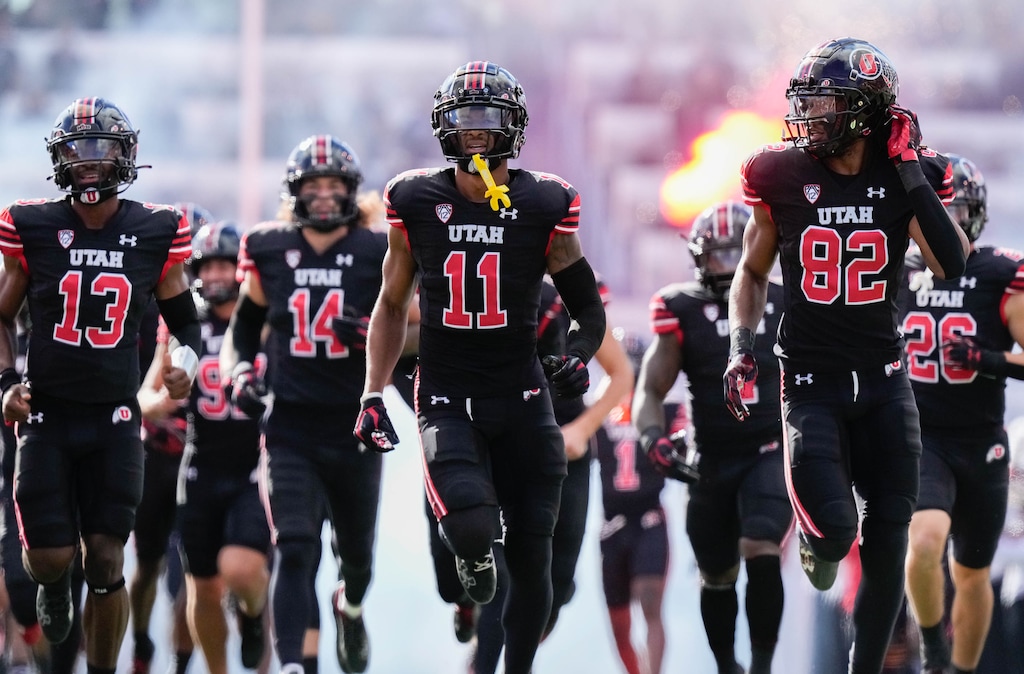 (Francisco Kjolseth  |  The Salt Lake Tribune) The Utah Utes run onto the field before the start of their game against the Arizona State Sun Devils in NCAA football in Salt Lake City on Saturday, Nov. 4, 2023.