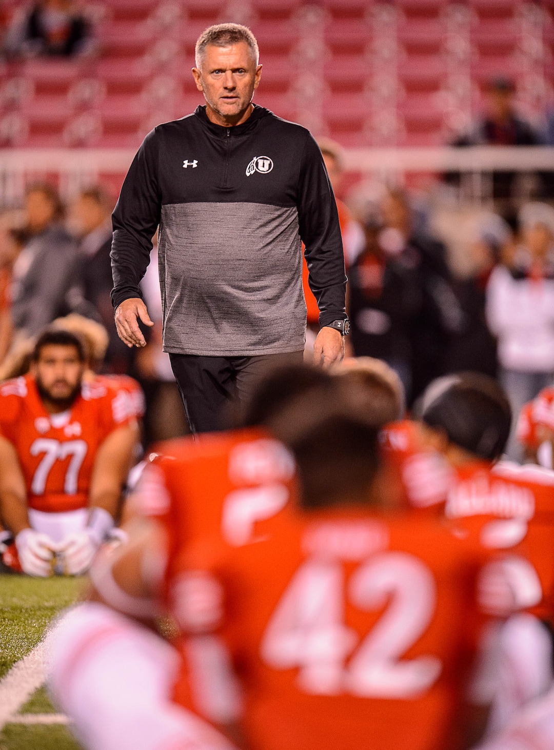 (Trent Nelson | The Salt Lake Tribune)  Utah coach Kyle Whittingham looks over his team pre-game as the University of Utah hosts Stanford, NCAA football at Rice-Eccles Stadium in Salt Lake City Saturday October 7, 2017.