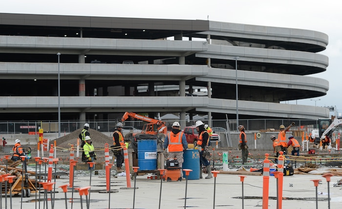 (Francisco Kjolseth  |  The Salt Lake Tribune)  The Salt Lake City Department of Airports gives a tour of the progress being made to replace the three aging terminals with a single central terminal building. Over time, the existing terminal, parking garage and concourses will be completely demolished and replaced with an estimated completion date of 2025.