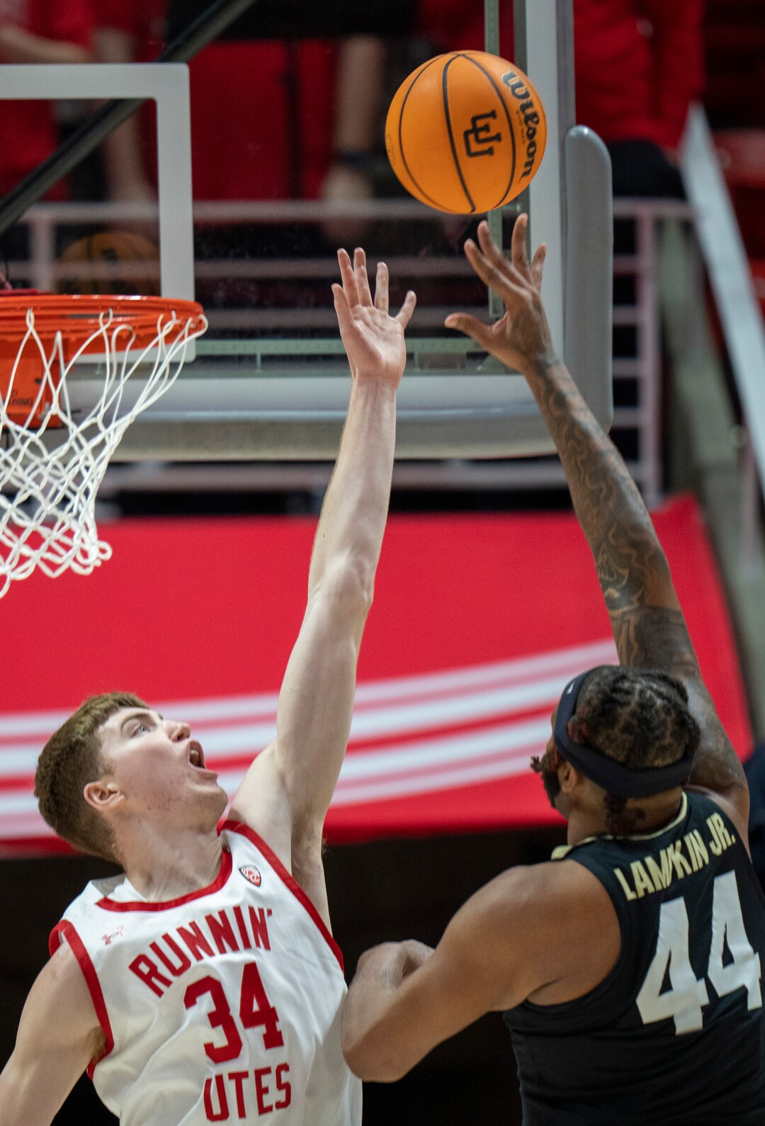 (Rick Egan | The Salt Lake Tribune) Colorado Buffaloes center Eddie Lampkin Jr. (44) shoots as Utah Utes center Lawson Lovering (34) defends, in PAC-12 basketball action between the Utah Utes and the Colorado Buffaloes a the Jon M. Huntsman Center, on Saturday, Feb. 3, 2024.