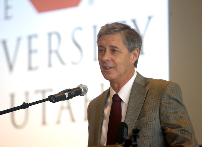 (Al Hartmann  |  Tribune File Photo)  University of Utah Athletic Director Chris Hill introduces Pac-12 Commissioner Larry Scott at a press conference at the Utah Natural History Museum Thursday February 9, 2012, before the start of the  "Front Porch" forum of the PAC 12 presidents.