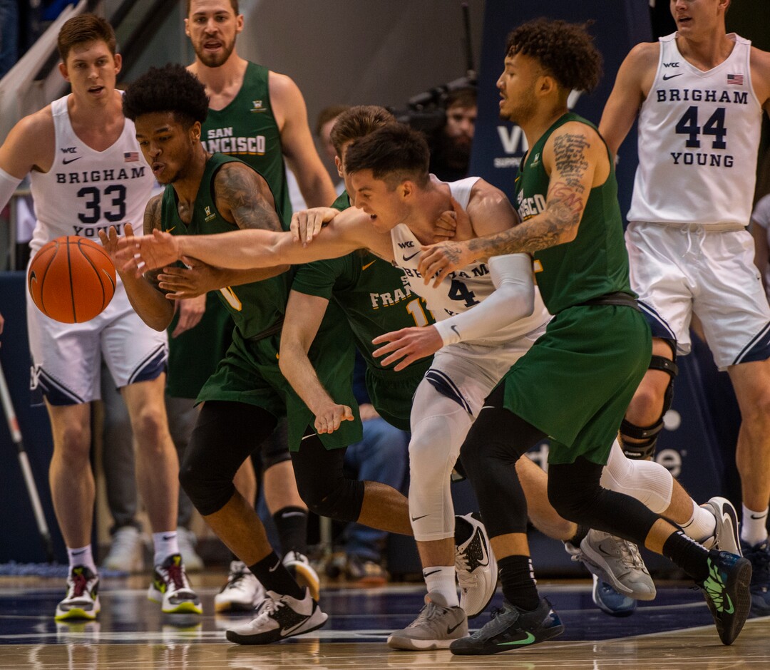 (Rick Egan  |  The Salt Lake Tribune)    Brigham Young Cougars guard Alex Barcello (4) goes for a loose ball along with San Francisco Dons guard Khalil Shabazz (0), in WCC basketball acton between the Brigham Young Cougars and the San Francisco Dons, at the Marriott Center, Saturday, Feb. 8, 2020.