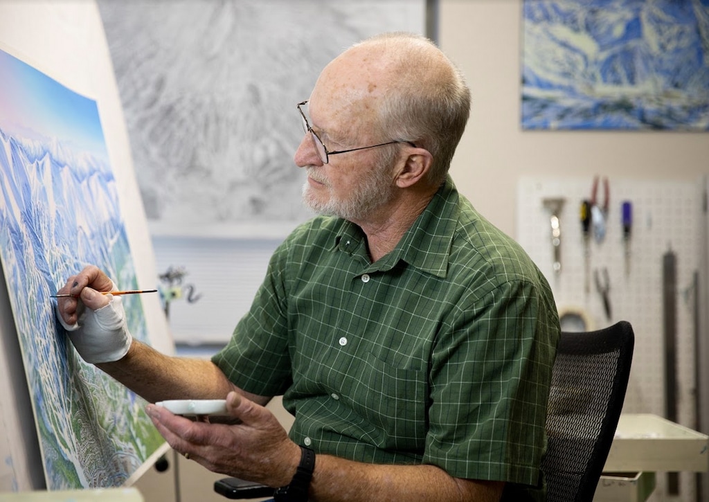 (Photo courtesy of Lindsay Pierce Martin) Longtime ski map artist James Niehues at work. Niehues has published a coffee table sized book of his work.
