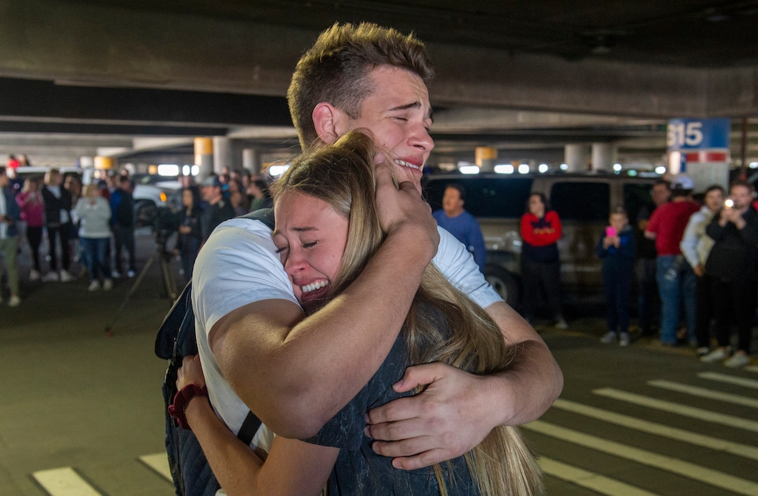 (Rick Egan  |  The Salt Lake Tribune)     Hope Preston welcomes home her brother Elder Kaleb Preston, from his mission in the Philippines, at the Salt Lake City International Airport. The Prestons are from Kaysville, Sunday, March 22, 2020.