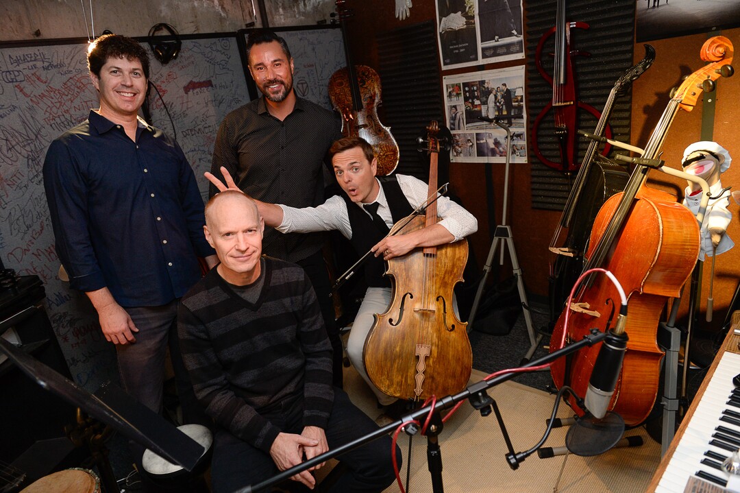 (Francisco Kjolseth  |  The Salt Lake Tribune)  Always having fun, The Piano Guys gather in their home studio in Sandy recently as they get ready for an upcoming show. Clockwise from left, videographer Paul Anderson, music producer Al van der Beek, cellist Steven Sharp Nelson and pianist Jon Schmidt maintain a close bond and are always quick with a tease or a joke while making music.