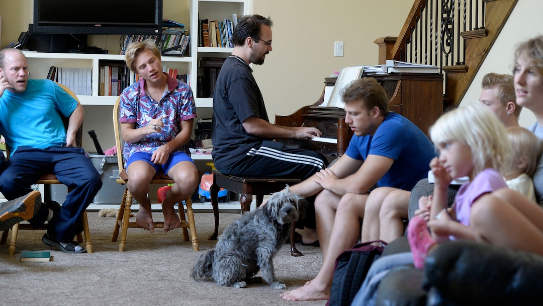 (Al Hartmann  |  The Salt Lake Tribune)
Believers in Denver Snuffer's Remnant movement gather in a Sandy home for a fellowship meeting Sunday, Aug. 13, to sing songs and partake of the sacrament.