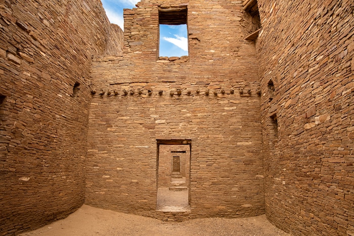 At Pueblo Bonito, millions of pieces of stone are fitted precisely together in structures up to five stories high, at the Chaco Culture National Historic Park in northwestern New Mexico, on Aug. 21, 2019. In the red rock desert of the Southwest, an ancient culture was thought to have vanished but a new view connects it to pueblo dwellers of today. (John Burcham/The New York Times)