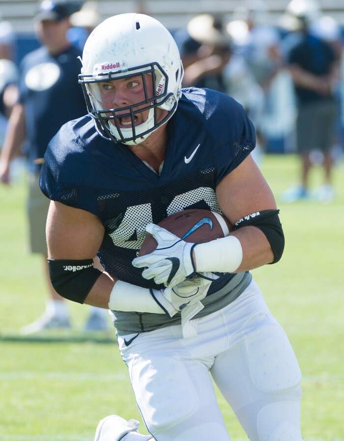 (Rick Egan  |  The Salt Lake Tribune) Runningback 	Kyle Griffitts (43), runs with the ball, during the Cougars scrimmage at Lavell Edwards Stadium, Thursday, August 17, 2017.