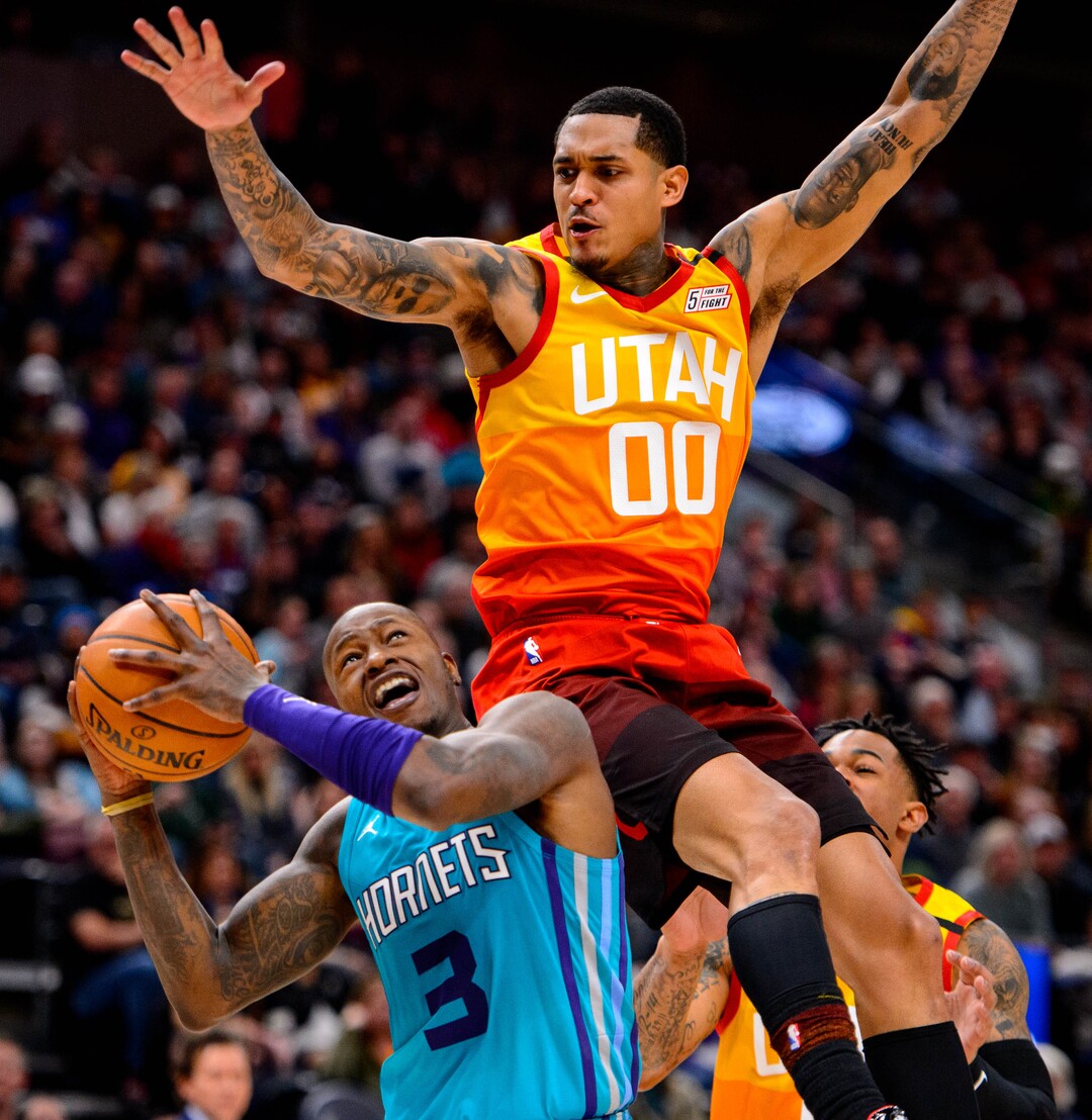 (Trent Nelson  |  The Salt Lake Tribune) Utah Jazz guard Jordan Clarkson (00) defending Charlotte Hornets guard Terry Rozier (3) as the Utah Jazz host the Charlotte Hornets, NBA basketball in Salt Lake City on Friday, Jan. 10, 2020.