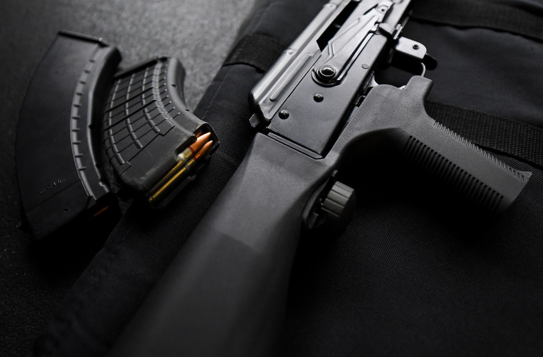 (Francisco Kjolseth  |  The Salt Lake Tribune)  A bump stock is pictured on an AKM-47 owned by Utah gun right advocate Clark Aposhian, one of only a handful of Americans who are legally allowed to keep their bump stock, a shooting accessory that alters semi-automatic rifles to fire in quick bursts like a machine gun. He is challenging the bump stock ban in court, and an appeals court has allowed him to keep his bump stock until his case is resolved in court.