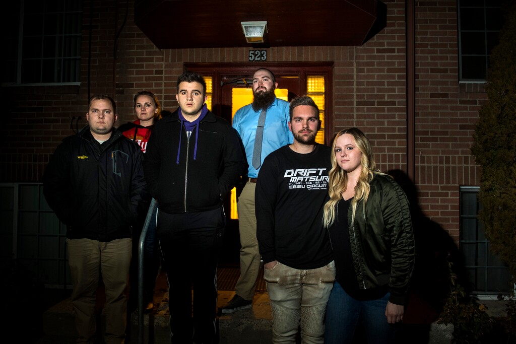(Chris Detrick  |  The Salt Lake Tribune)  Rylyn Patterson, Shayla Patterson, Mike Youd, Joe Piret,  Jordan Atkin and Stormie Atkin pose for a portrait outside their Provo apartment building, which is currently without heat, Thursday, Jan. 4, 2018.