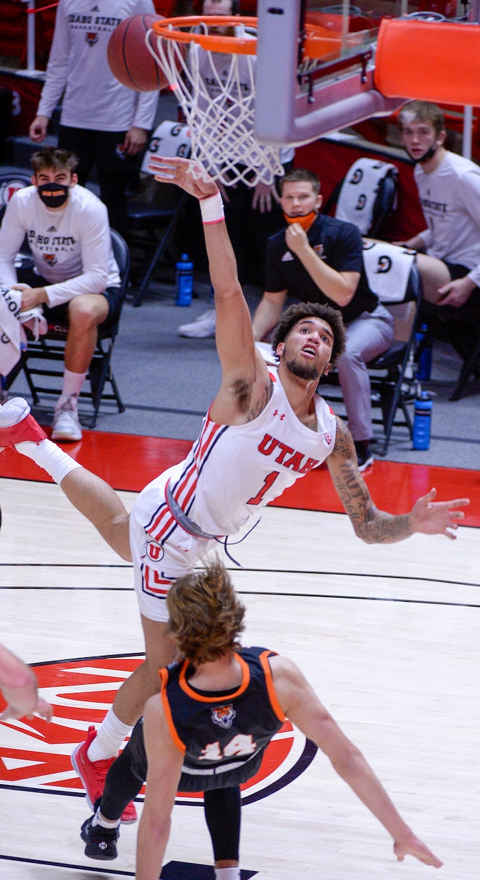 (Leah Hogsten  |  The Salt Lake Tribune) Utah Utes forward Timmy Allen (1) with a layup during the Idaho State NCAA basketball matchup Tuesday, Dec. 8, 2020 at the Jon M. Huntsman Center.
