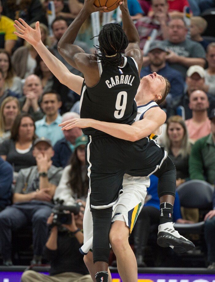 (Rick Egan  |  The Salt Lake Tribune) Brooklyn Nets forward DeMarre Carroll (9) collides with Utah Jazz forward Jonas Jerebko (8), in NBA action, Utah Jazz vs. Brooklyn Nets, in Salt Lake City, Saturday, November 11, 2017.