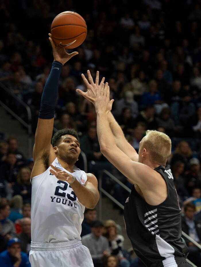 (Rick Egan  |  The Salt Lake Tribune)       Brigham Young Cougars forward Yoeli Childs (23) shoots as Santa Clara Broncos forward Henrik Jadersten (3) defends, in basketball action between Brigham Young Cougars and Santa Clara Broncos at the Marriott Center in Provo, Saturday, Jan. 12, 2019.


