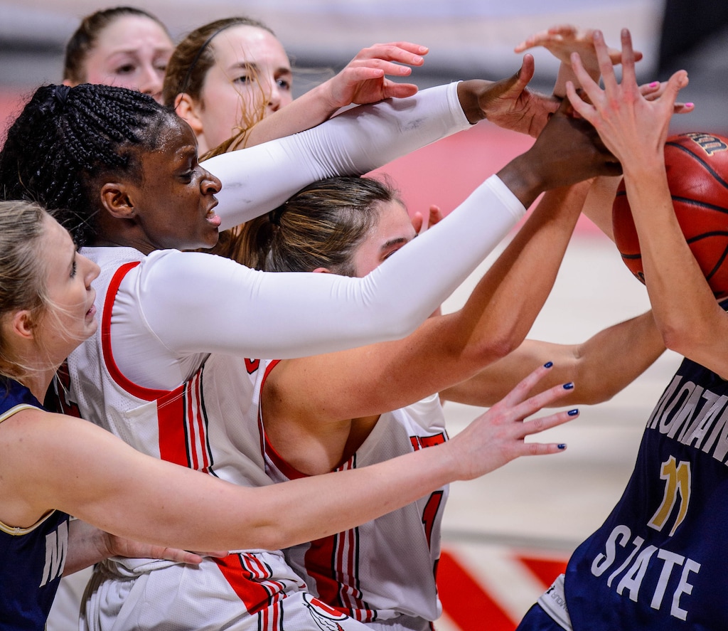 (Trent Nelson  |  The Salt Lake Tribune) Utah Utes forward Lola Pendande (12) and Utah Utes guard Kemery Martin (15) as Utah hosts Montana State, NCAA basketball in Salt Lake City on Friday, Dec. 11, 2020.