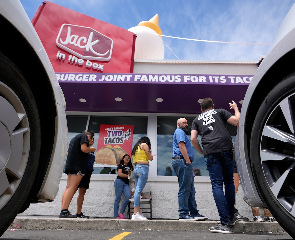 (Leah Hogsten | The Salt Lake Tribune) The wait was at least a hour for people in line to place an order at Jack in the Box, now open on 2100 South in Salt Lake City Thursday, June 22, 2023.