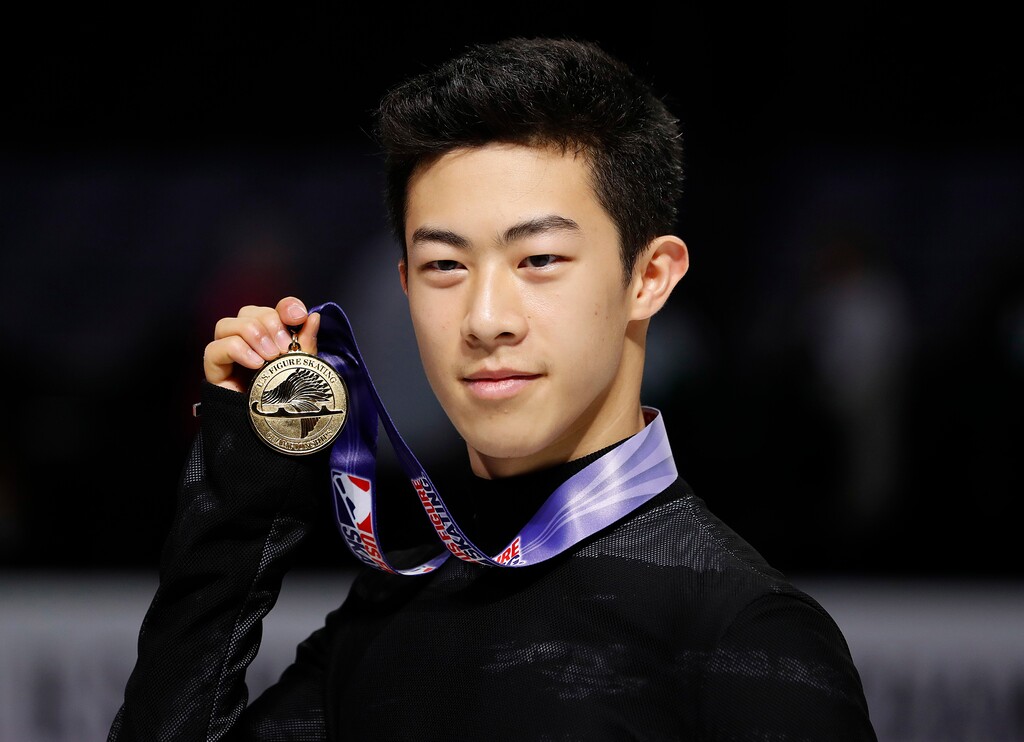 Nathan Chen poses after winning the men's skate event at the U.S. Figure Skating Championships in San Jose, Calif., Saturday, Jan. 6, 2018. (AP Photo/Tony Avelar)