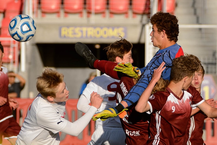 (Trent Nelson | The Salt Lake Tribune)  Judge Memorial faces Morgan High School in the 3A state championship game, Saturday May 12, 2018. Morgan goalkeeper Trek Loveridge.