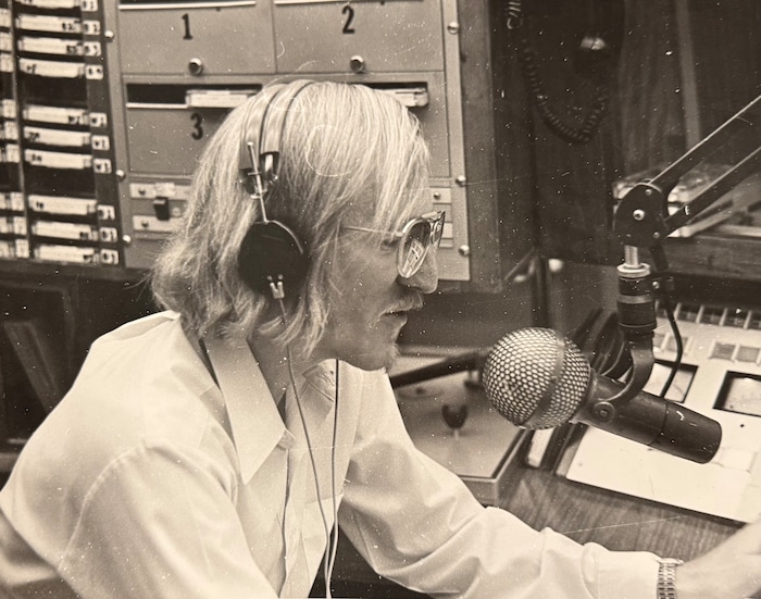 (Jay Leaf) "Skinny" Johnny Mitchell behind the mic. A popular and groundbreaking DJ, mostly on KCPX-AM during the '70s and '80s, Mitchell died Jan. 1, 2025 at age 82. 