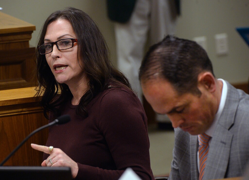 (Al Hartmann | The Salt Lake Tribune)
Terry Mitchell who was allegedley sexually assaulted by a federal prosecuter in 1981 speaks out against HB 298 Vicitim Confidentiality Amendments at the House Judiciry Committee Friday Feb. 23 2018. Bill sponsor Rep. Mike McKell, R-Spanish Fork listens to her story, right.