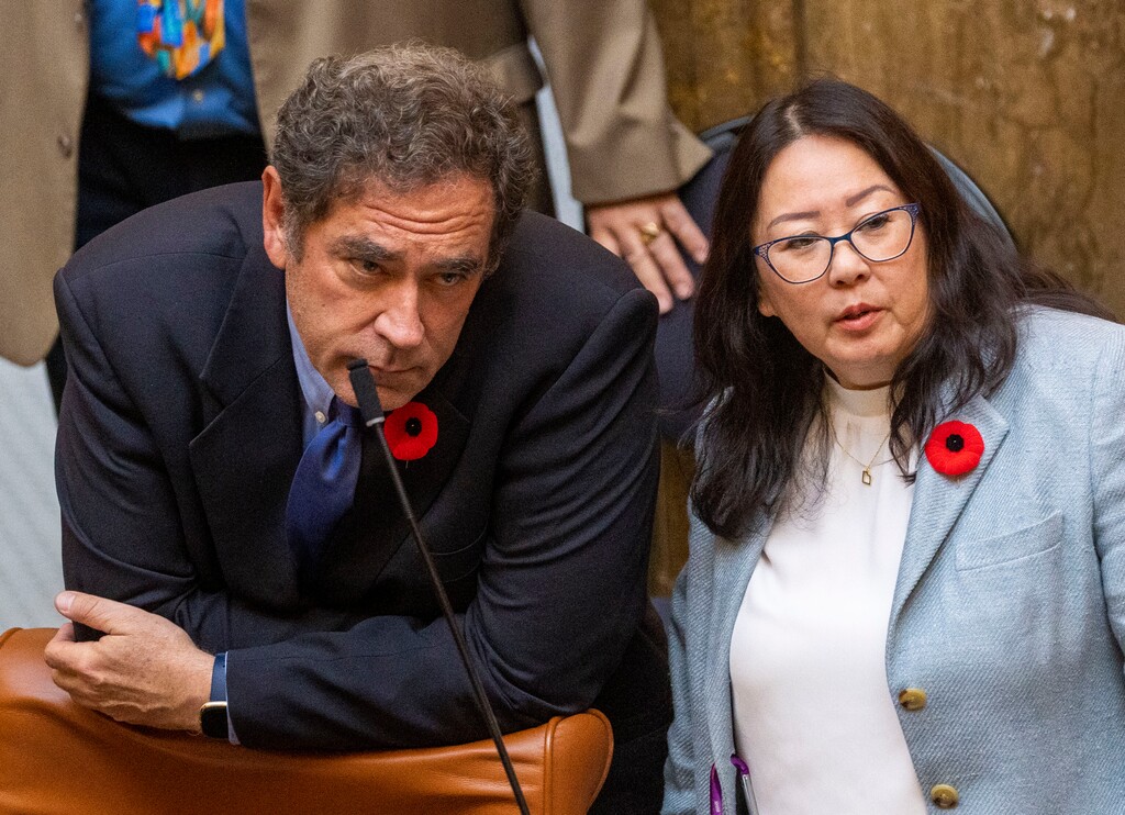 (Rick Egan | The Salt Lake Tribune) Rep. Brian King and Rep Karen Kwan, watch the votes on the new district maps, during the legislative special session, on Wednesday, Nov. 10, 2021.