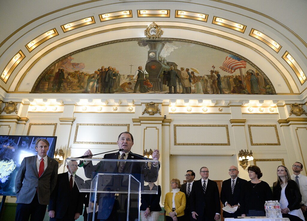 (Francisco Kjolseth  |  The Salt Lake Tribune)  The completion of the transcontinental railroad is depicted above as Gov. Gary Herbert and others hold news conference at the Union Pacific Depot in Salt Lake on Friday, Feb. 2, 2019, to announce plans for Spike 150, the 150th anniversary of the driving of the final Golden Spike.
