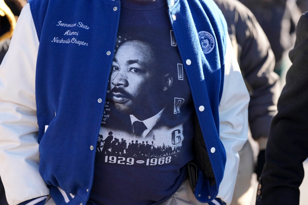 A person wears a Martin Luther King Jr. shirt during the Nashville MLK Day March, Monday, Jan. 20, 2025, in Nashville, Tenn. (AP Photo/George Walker IV)