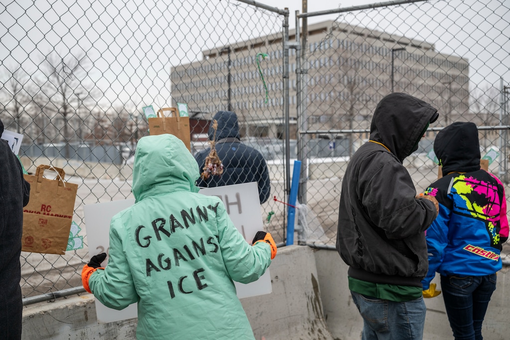 (Victor J. Blue | The New York Times) People protest President Donald Trump’s immigration crackdown at the Whipple Federal Building in Minneapolis.