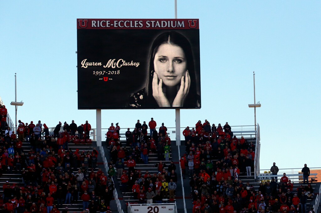 (Rick Bowmer | The Associated Press) In this Nov. 10, 2018, file photo, a photograph of University of Utah student and track athlete Lauren McCluskey, who was fatally shot on campus, is projected on the video board before the start of an NCAA college football game between Oregon and Utah in Salt Lake City. A gun law proposal inspired by the shooting death of McCluskey stalled again Monday, March 11, 2019, after state lawmakers disagreed on whether gun owners should be held liable when loaned firearms are used in a crime.