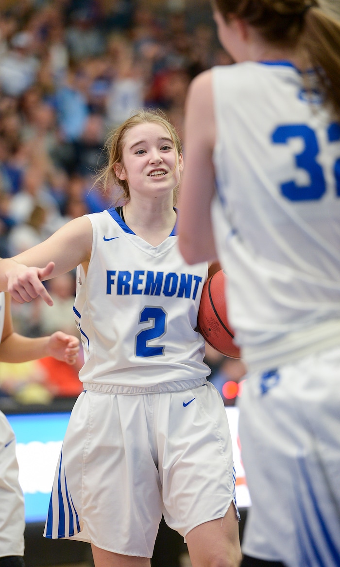 (Leah Hogsten  |  The Salt Lake Tribune) Fremont's Halle Duft (02) celebrates the play of teammate Fremont's Haylee Doxey (32) who had 7 rebounds and 8 points.  Fremont defeated Bingham 61-47 to win the 6A High School Girls' Basketball Tournament title at SLCC in Taylorsville,Saturday, Feb. 24, 2018. 