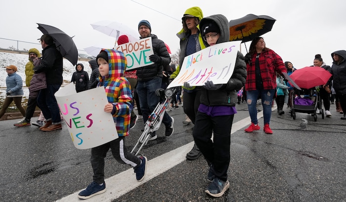 (Leah Hogsten | The Salt Lake Tribune) Over 200 people attended the rally and march at East High School on Monday. To commemorate the legacy and work of Martin Luther King, Jr. and many other activists fighting for racial equality during the Civil Rights movement, the University of Utah's office of Equity, Diversity & Inclusion kicked off MLK Week 2023 with a rally at East High School, followed by a march to Kingsbury Hall, Jan. 16, 2023. 