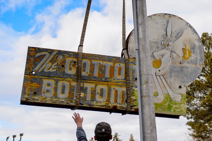 (Trent Nelson  |  The Salt Lake Tribune) The iconic sign at the Cotton Bottom Inn in Holladay is removed on Thursday, Jan. 9, 2020. The sign is being restored by Brimley Neon, which specializes in vintage sign repair.