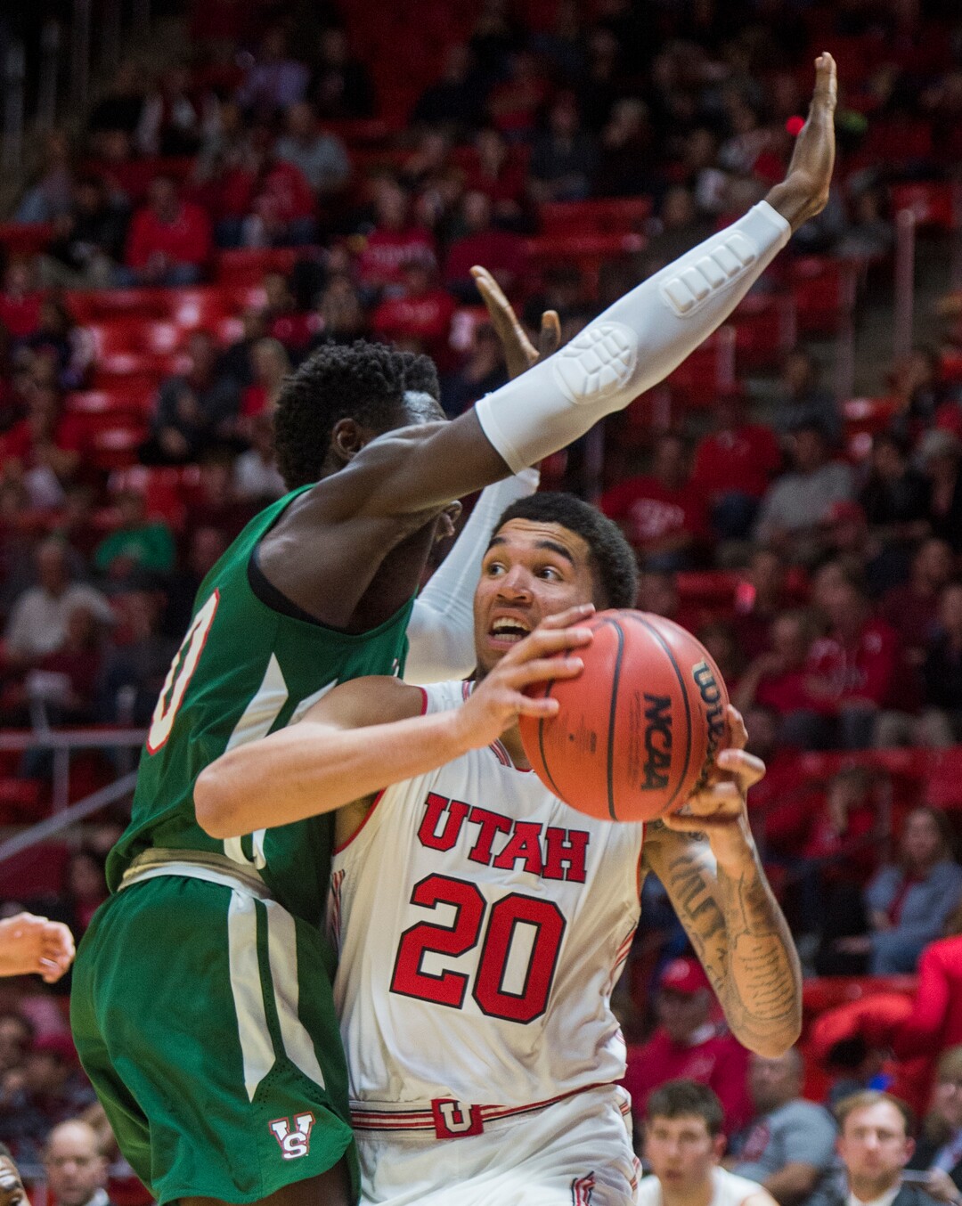 (Rick Egan  |  The Salt Lake Tribune)    Utah Utes forward Timmy Allen (20) tries to work the ball inside, as Mississippi Valley State Delta Devils center Emmanuel Ejeh (10) defends, in basketball action between Utah Utes and Mississippi Valley State Delta Devils at the Jon M. Huntsman Center, Thursday, Nov. 15, 2018.