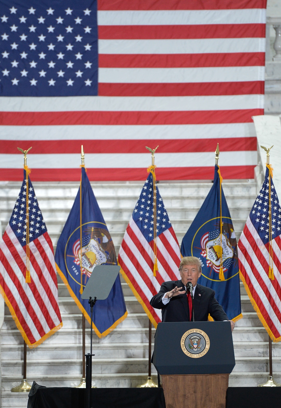 (Francisco Kjolseth  |  The Salt Lake Tribune)  U.S. President Donald Trump takes the stage at the Utah Capitol on Monday, Dec. 4, 2017, to sign two presidential proclamations to shrink Bears Ears and Grand Staircase-Escalante national monuments.