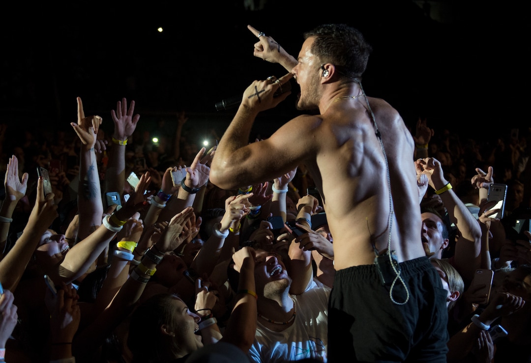 (Rick Egan  |  The Salt Lake Tribune)     Dan Reynolds performs with Imagine Dragons at the Loveloud Festival at Rice-Eccles Stadium, Saturday, July 28, 2018.