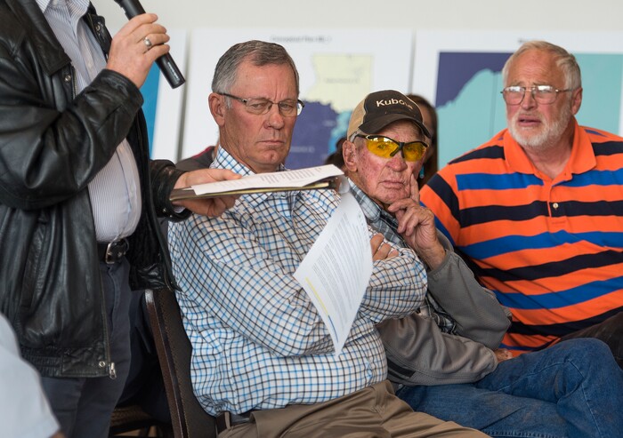 (Leah Hogsten  |  The Salt Lake Tribune) San Juan County Commissioner Chair Bruce Adams, left, listens as Blanding Mayor-elect Joe B. Lyman reads a resolution approved by the Blanding City Council which opposes any three-member district that divides the community.
San Juan County residents were presented with proposals of the newly redrawn county commission and school board districts during hearings in Monticello and Bluff, November 16, 2017. The new boundaries would ensure significant American Indian majorities in two of three County Commission districts and on four of five school board voting districts as the result of a January 2012 lawsuit filed in U.S. District Court by the Navajo Nation. The lawsuit seeks the redrawing of voting districts to reflect the 2010 U.S. Census.